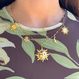 Multiple sun necklace