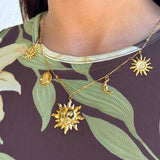 Multiple sun necklace